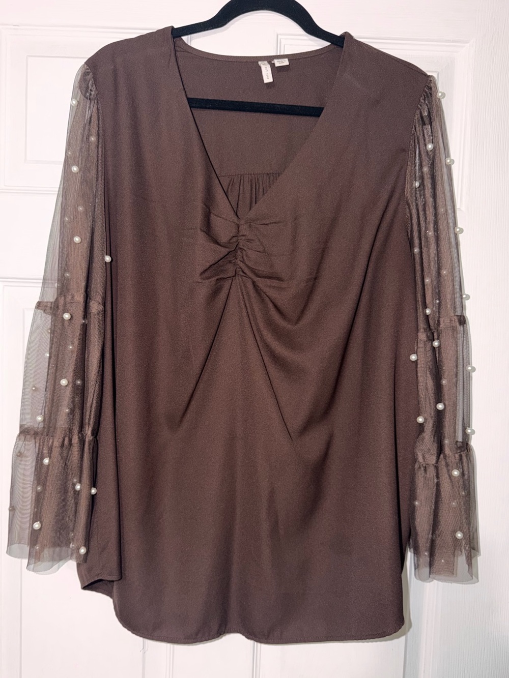 Brown blouse with pearl sleeves